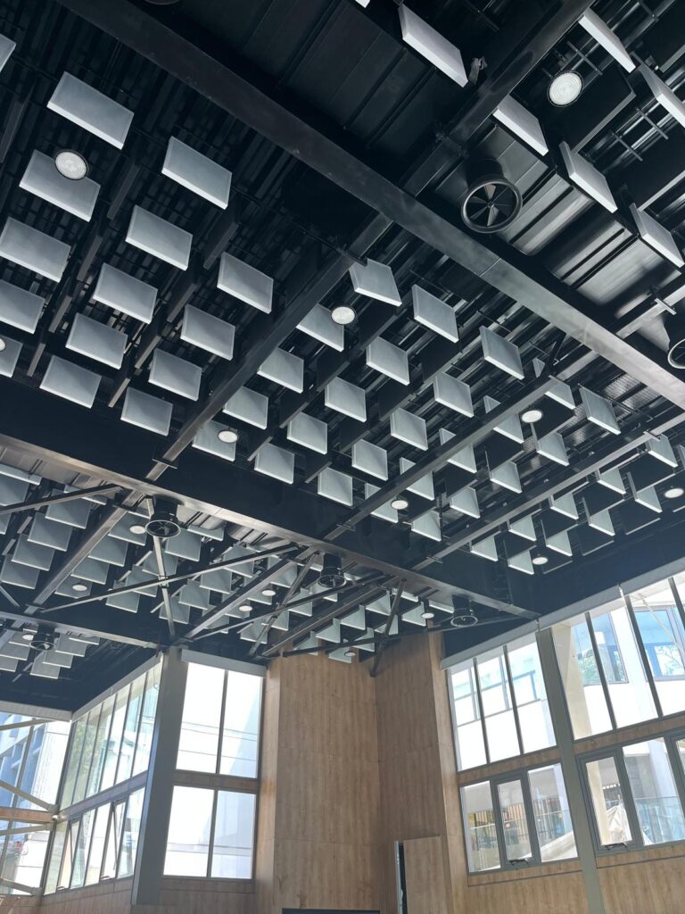 Acoustic baffles installed in a gymnasium in Lebanon to control echo and improve sound quality.