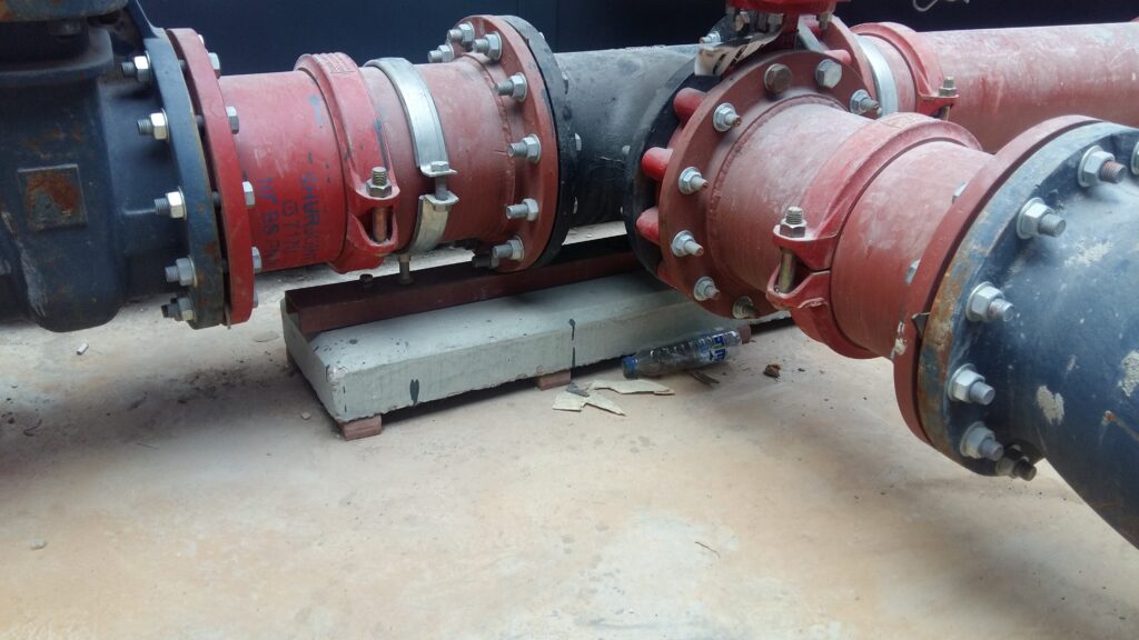 Floating pads installed under mechanical equipment to reduce vibration.