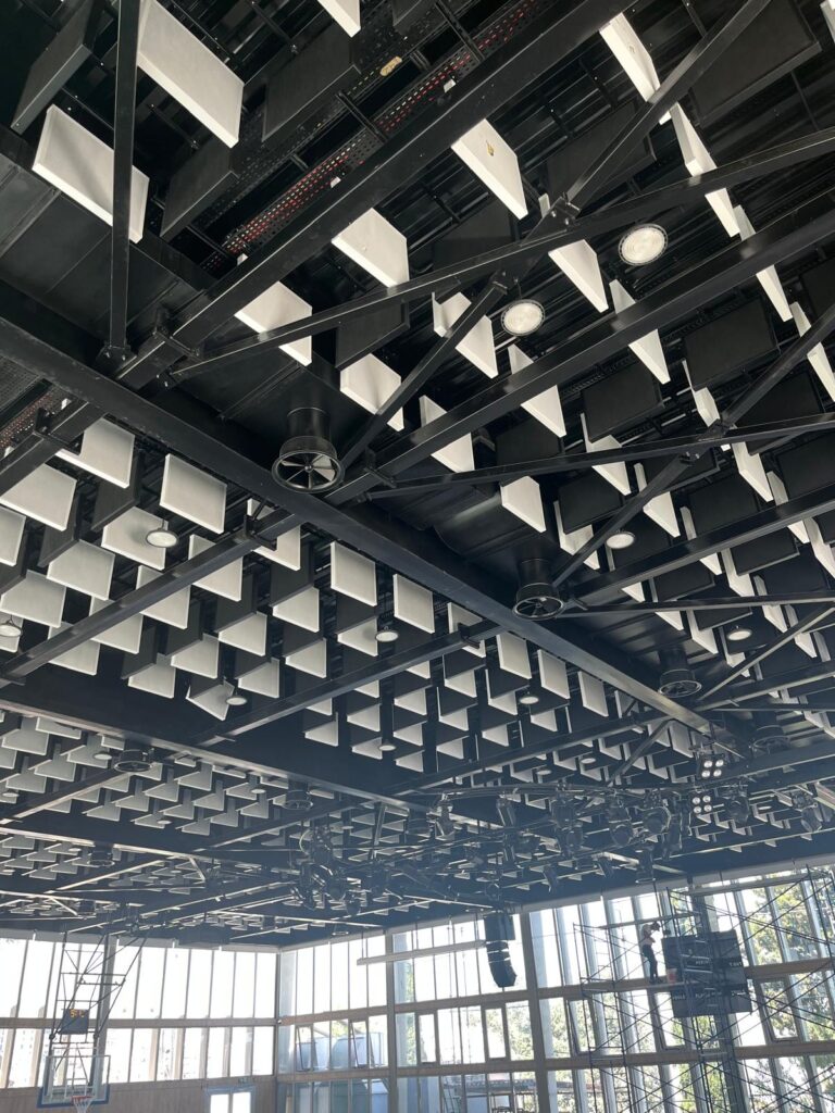 Close-up of custom acoustic baffles used at International College basketball court in Lebanon.