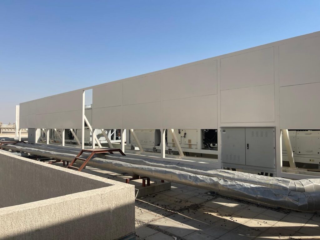 Acoustic noise control for chillers impacting nearby school environment.