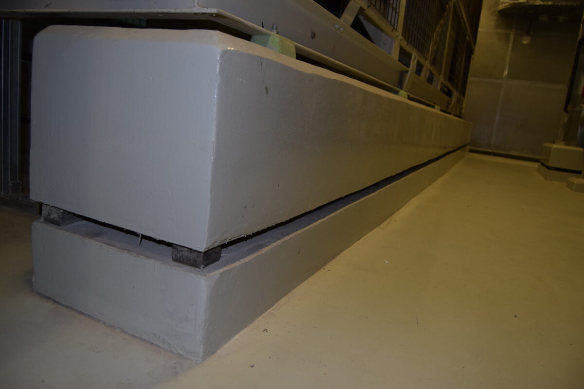 Floating pad installed under pump to reduce vibration and structure-borne noise.