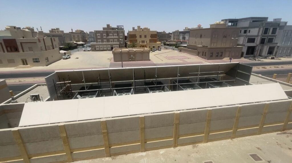 Acoustic barrier and wall panels installed to control HVAC noise.