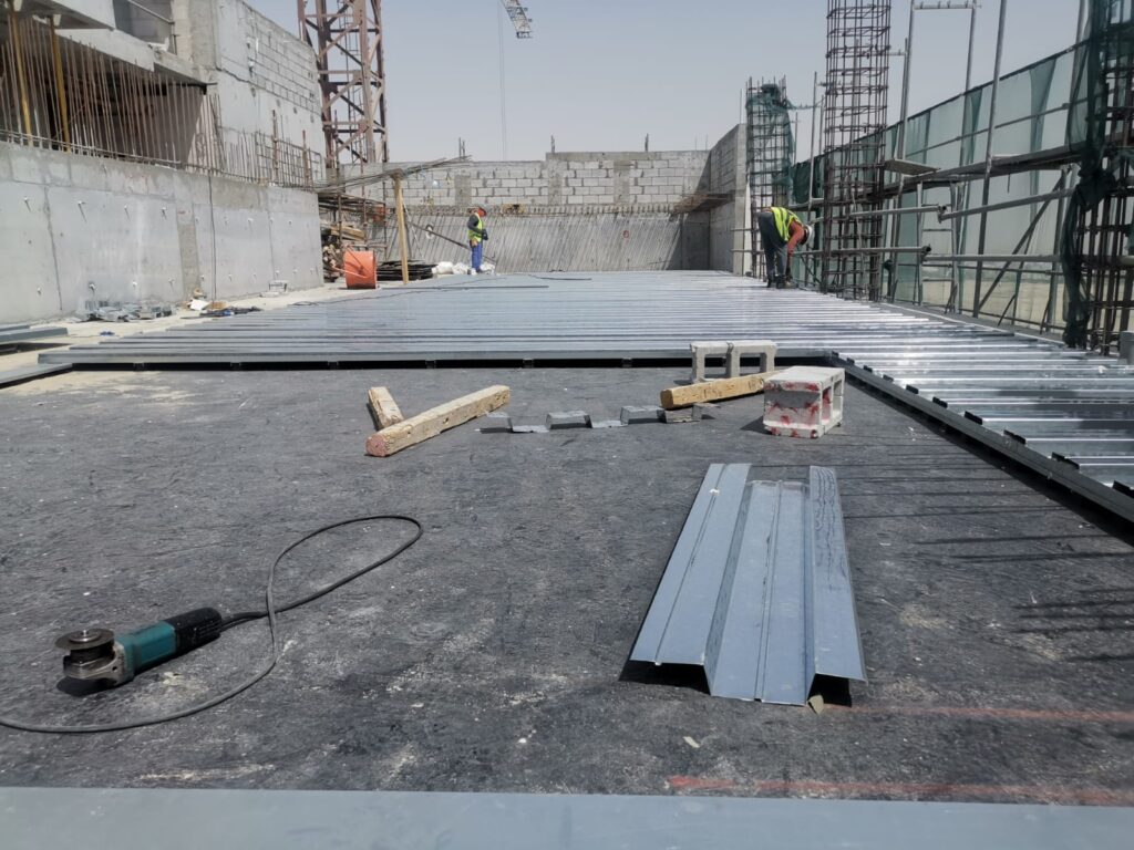Rooftop floating swimming pool above residential apartments.