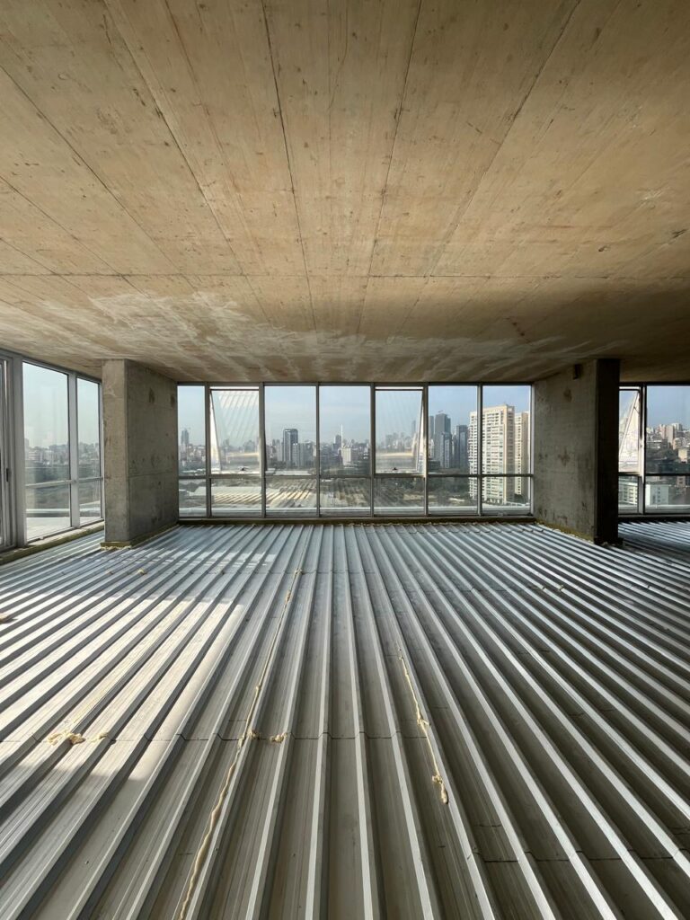 Floating floor system being installed in a gym above offices in Sin El Fil, Lebanon
